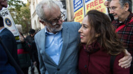 UK MP Jeremy Corbyn and Assange’s partner Stella Moris, outside court in London